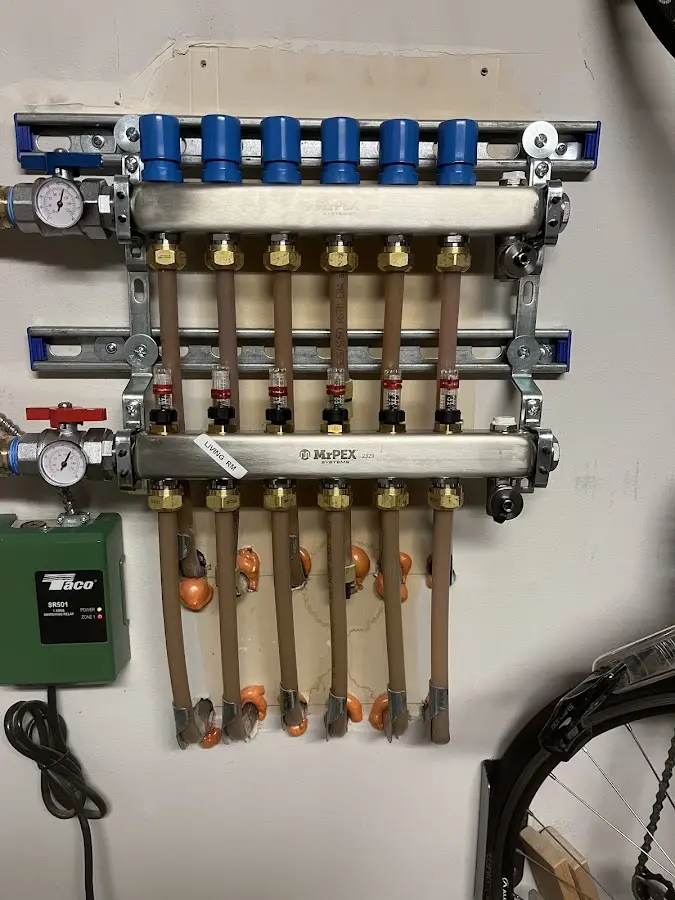 Plumber performing Water Heater Repair at a residential property in Pupukea